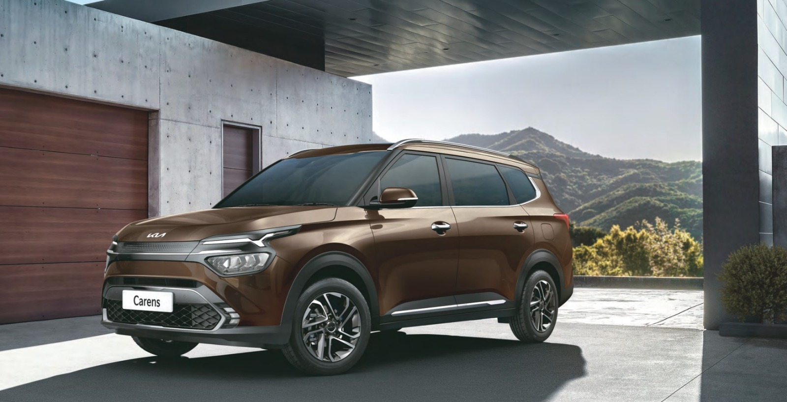 : Kia Carens 2023 with modern stylish and bold design brown colour